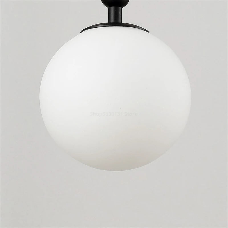 Casa Lumière Glazen Wandlamp - Ronde Bol & Metalen Arm